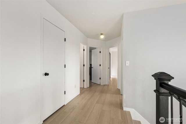 21813 43rd Avenue Ct E, Spanaway, WA 98387 - hallway featuring light wood-style floors and baseboards