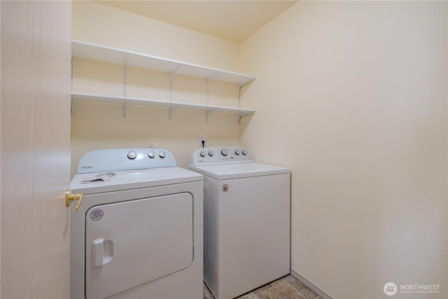 laundry area featuring laundry area and independent washer and dryer