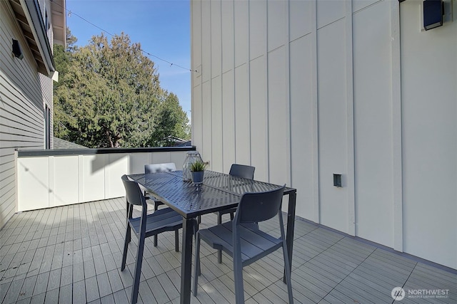 deck featuring outdoor dining area