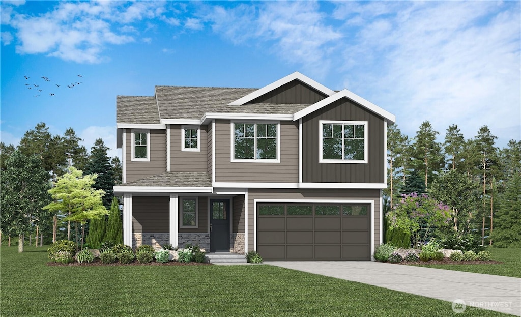 view of front of property with an attached garage, driveway, and a front yard