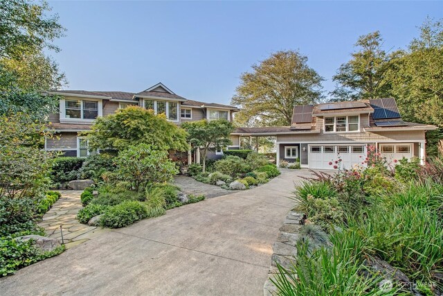 1935 False Bay Dr, Friday Harbor, WA 98250 - view of front of house featuring concrete driveway and solar panels