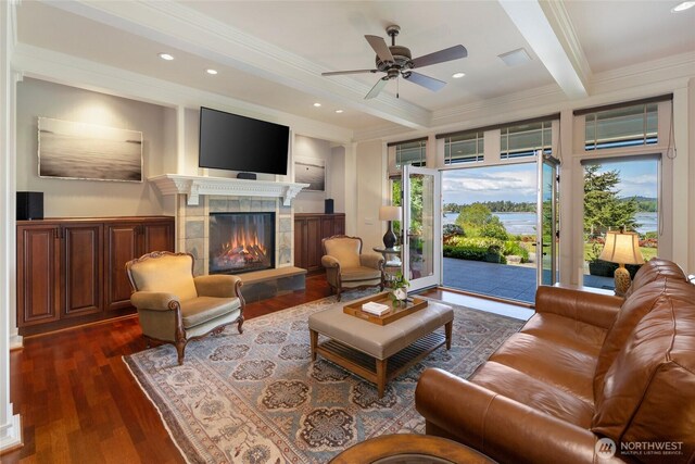 1935 False Bay Dr, Friday Harbor, WA 98250 - living area with ornamental molding, dark wood-style flooring, a fireplace, a ceiling fan, and recessed lighting