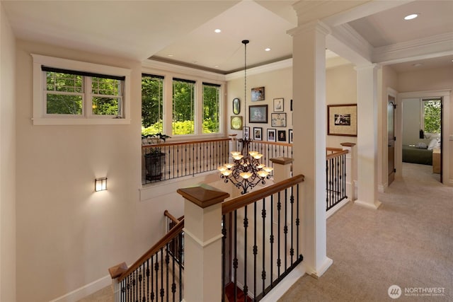 1935 False Bay Dr, Friday Harbor, WA 98250 - corridor featuring an upstairs landing, baseboards, carpet floors, ornamental molding, and a chandelier