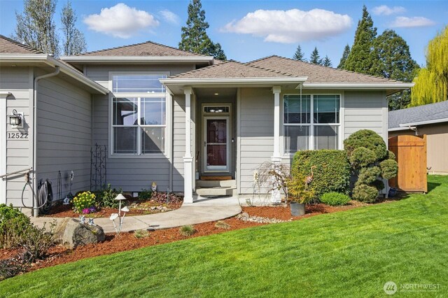 view of front of home with a front yard