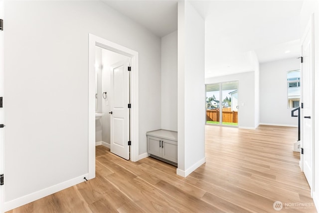 13906 178th Street Ct E Unit 62, Puyallup, WA 98374 - corridor featuring light wood finished floors and baseboards