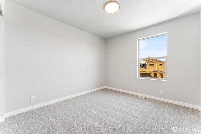 13906 178th Street Ct E Unit 62, Puyallup, WA 98374 - unfurnished room featuring baseboards and carpet flooring