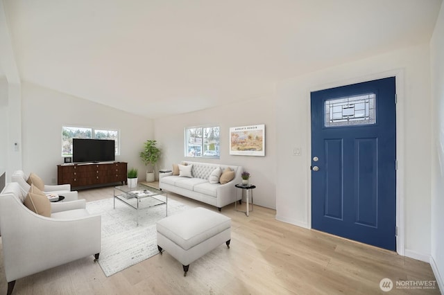 7110 146th St SW Unit 35, Lakewood, WA 98439 - living area with light wood finished floors and lofted ceiling