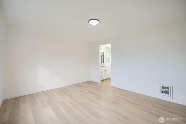 7110 146th St SW Unit 35, Lakewood, WA 98439 - empty room with visible vents, baseboards, and light wood-style floors