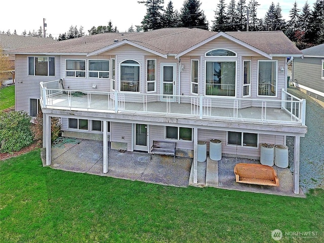 1433 Crestview Dr, Camano Island, WA 98282 - back of property with a patio, a lawn, and roof with shingles