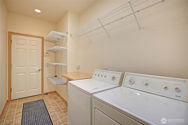 1433 Crestview Dr, Camano Island, WA 98282 - laundry room featuring washing machine and dryer and baseboards