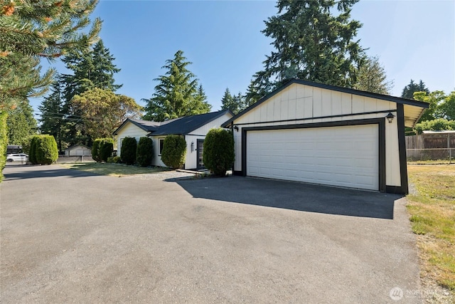817 SW 158th St, Burien, WA 98166 - ranch-style home with a detached garage and an outdoor structure