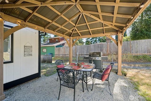 817 SW 158th St, Burien, WA 98166 - fenced backyard with a gazebo, grilling area, a patio, and outdoor dining space