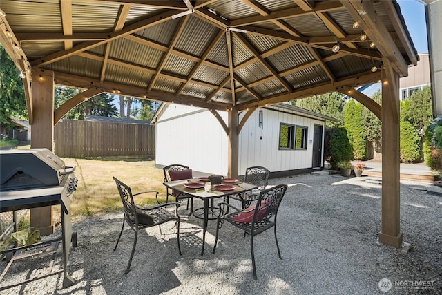 817 SW 158th St, Burien, WA 98166 - view of patio / terrace with a gazebo, outdoor dining space, area for grilling, and an outbuilding