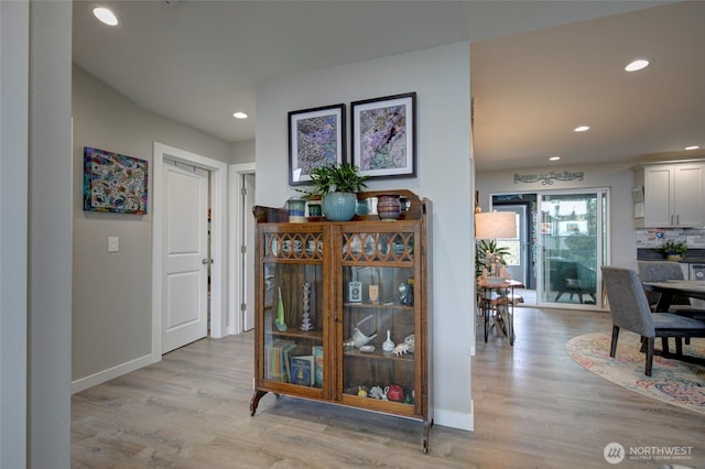 1436 Sand Pebble Ave SW, Ocean Shores, WA 98569 - corridor with light wood finished floors, recessed lighting, and baseboards