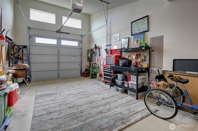 1436 Sand Pebble Ave SW, Ocean Shores, WA 98569 - garage featuring electric panel and a garage door opener