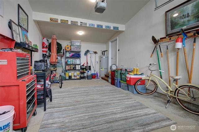 1436 Sand Pebble Ave SW, Ocean Shores, WA 98569 - garage with strapped water heater and a garage door opener