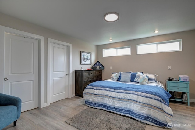1436 Sand Pebble Ave SW, Ocean Shores, WA 98569 - bedroom featuring recessed lighting, baseboards, and light wood-style floors