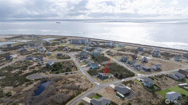 1436 Sand Pebble Ave SW, Ocean Shores, WA 98569 - birds eye view of property with a water view