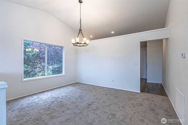 unfurnished room with carpet floors, visible vents, an inviting chandelier, baseboards, and vaulted ceiling