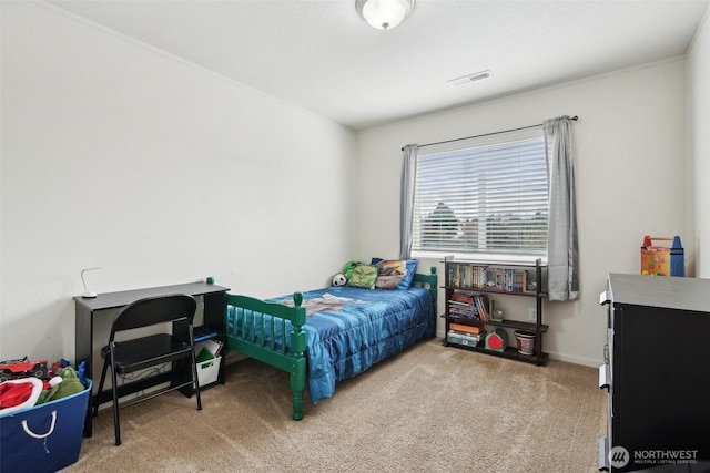 carpeted bedroom featuring visible vents and baseboards