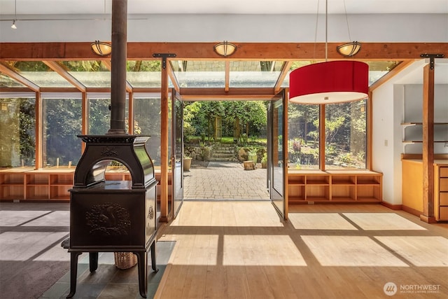 sunroom / solarium featuring plenty of natural light