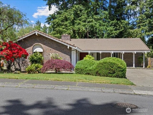 3616 SW 325th St, Federal Way, WA 98023 - ranch-style home featuring a tile roof, a chimney, brick siding, and driveway