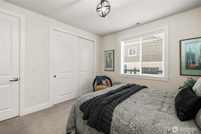 22867 SE Cherry St, Black Diamond, WA 98010 - bedroom with visible vents, baseboards, carpet, and a closet