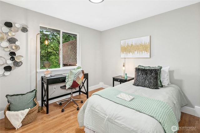 17406 Redhawk Dr, Arlington, WA 98223 - bedroom with baseboards and wood finished floors