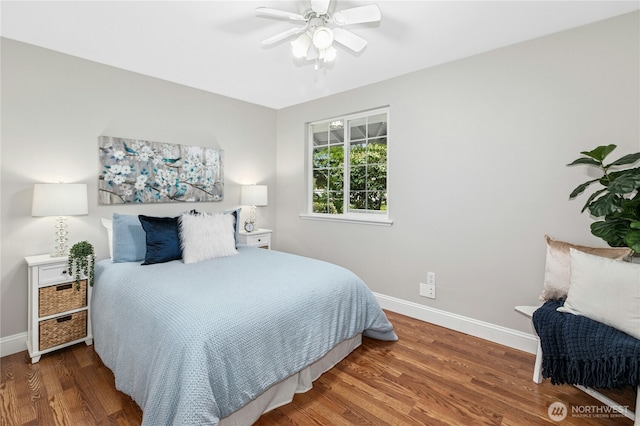 17406 Redhawk Dr, Arlington, WA 98223 - bedroom featuring baseboards, wood finished floors, and a ceiling fan