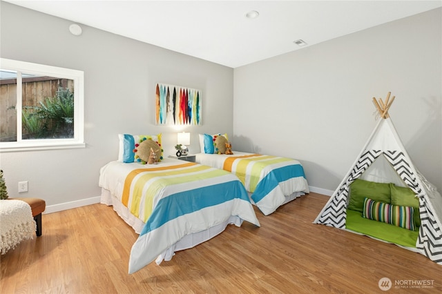 17406 Redhawk Dr, Arlington, WA 98223 - bedroom with baseboards and wood finished floors