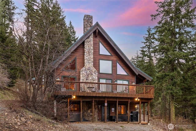 791 Lake Forest Dr, Ronald, WA 98940 - back of property with a wooden deck and a chimney