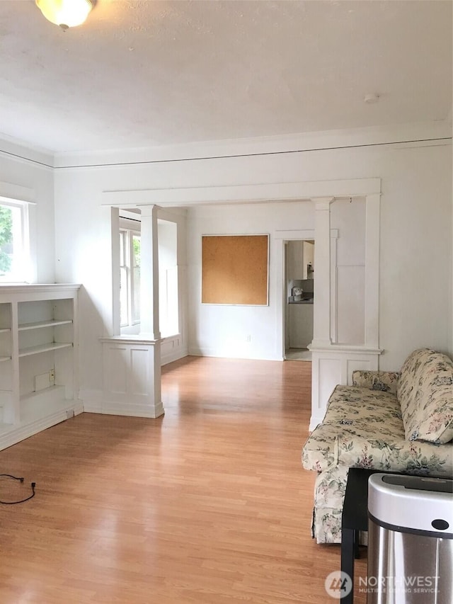 5011 8th Ave NE, Seattle, WA 98105 - unfurnished living room featuring light wood-style floors