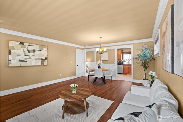 1625 185th Street Ct E, Spanaway, WA 98387 - living area with a chandelier, crown molding, and dark wood-type flooring