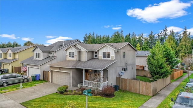 1625 185th Street Ct E, Spanaway, WA 98387 - traditional-style home featuring a porch, concrete driveway, roof with shingles, a residential view, and board and batten siding