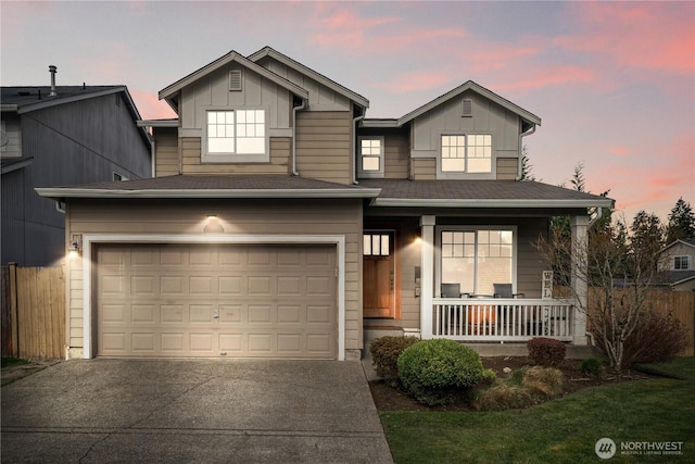 1625 185th Street Ct E, Spanaway, WA 98387 - view of front of property featuring a porch, concrete driveway, board and batten siding, and a garage