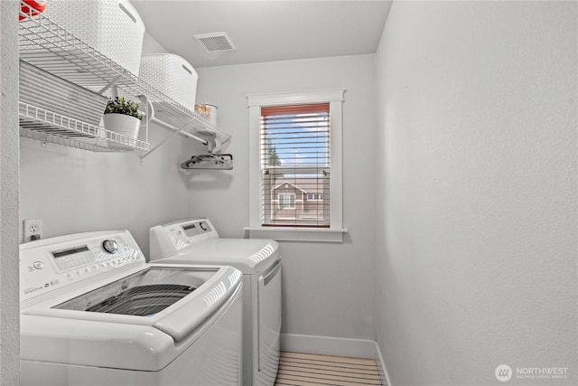 1625 185th Street Ct E, Spanaway, WA 98387 - laundry area featuring washer and clothes dryer and baseboards