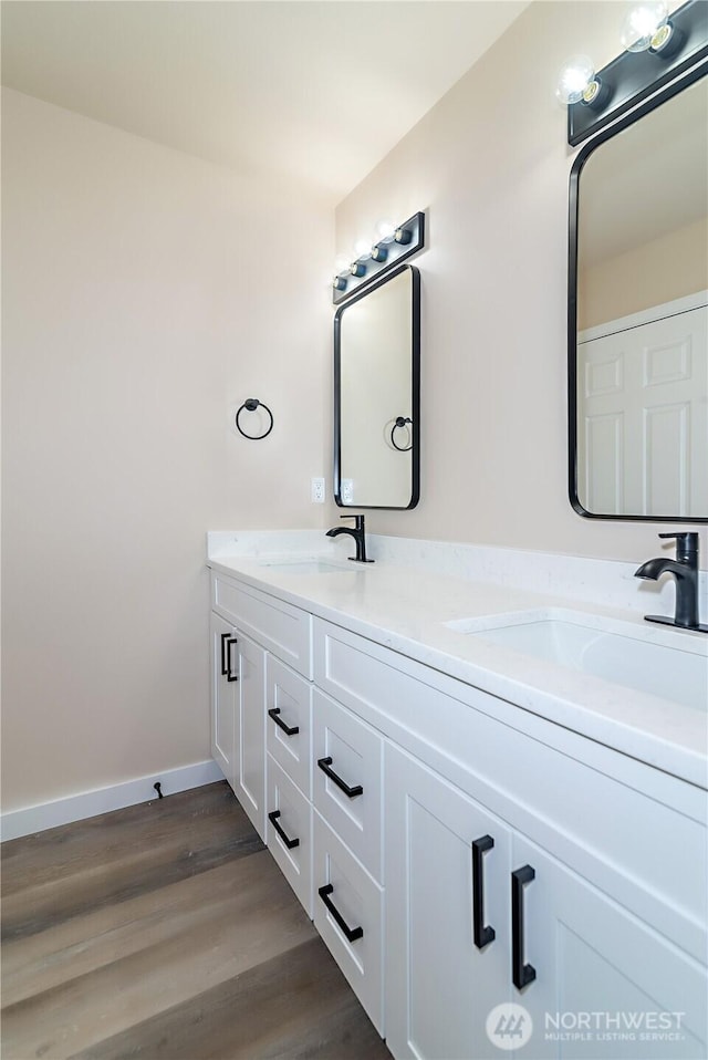 16283 Hwy 97, Ellensburg, WA 98926 - bathroom with double vanity and wood finished floors