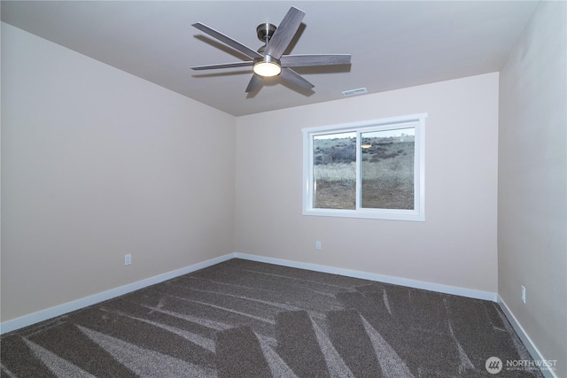 16283 Hwy 97, Ellensburg, WA 98926 - unfurnished room with dark colored carpet and a ceiling fan