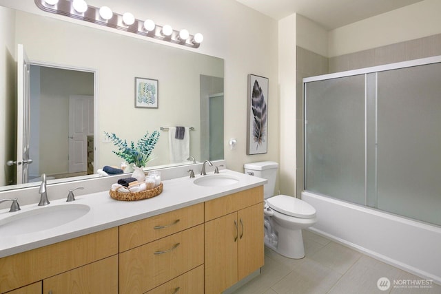 588 241st Ln SE, Sammamish, WA 98074 - full bath featuring double vanity, toilet, enclosed tub / shower combo, and a sink