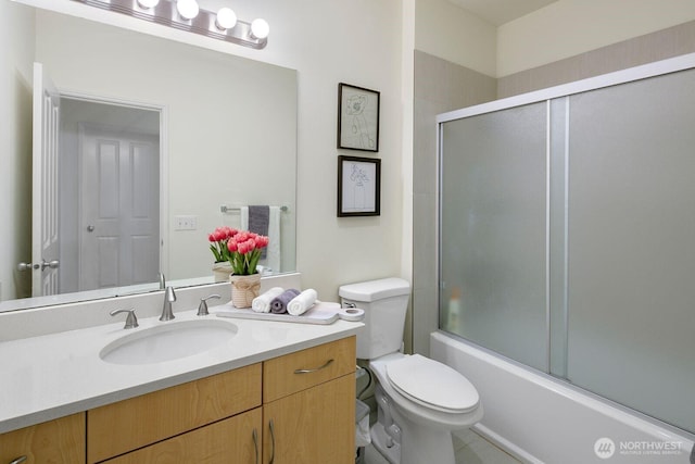 588 241st Ln SE, Sammamish, WA 98074 - bathroom featuring vanity, enclosed tub / shower combo, and toilet