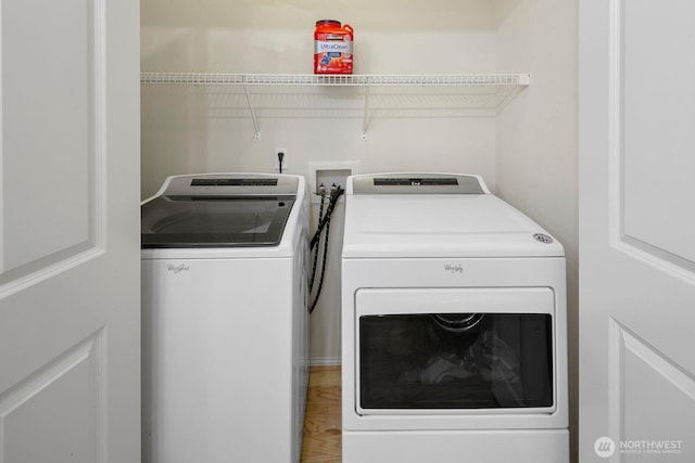 588 241st Ln SE, Sammamish, WA 98074 - laundry room featuring laundry area and washer and dryer
