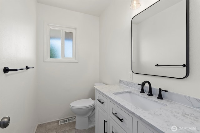 1918 SE Maple Dr, Chehalis, WA 98532 - half bathroom featuring vanity, toilet, and baseboards