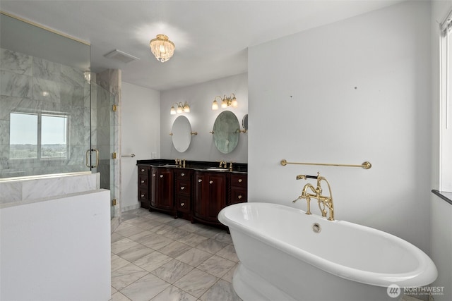 1918 SE Maple Dr, Chehalis, WA 98532 - bathroom featuring marble finish flooring, double vanity, a soaking tub, and a stall shower