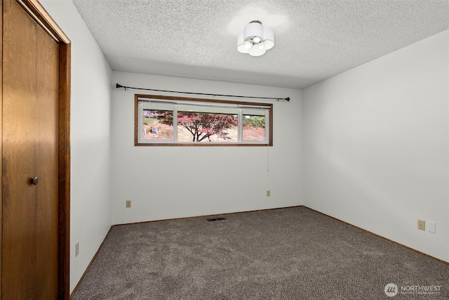 1918 SE Maple Dr, Chehalis, WA 98532 - unfurnished bedroom with carpet and a textured ceiling