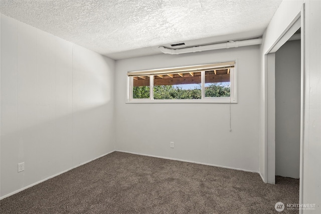 1918 SE Maple Dr, Chehalis, WA 98532 - carpeted spare room featuring a textured ceiling