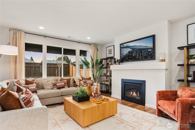 1133 68th Ave SE, Tumwater, WA 98501 - living area with recessed lighting, light wood-style floors, and a glass covered fireplace