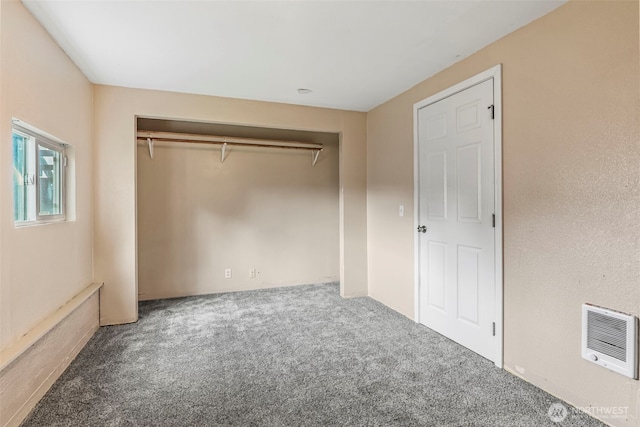 160 Maple St, Cathlamet, WA 98612 - unfurnished bedroom with heating unit, carpet flooring, and a closet
