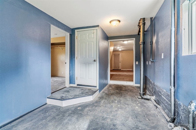 160 Maple St, Cathlamet, WA 98612 - interior space with baseboards and concrete flooring