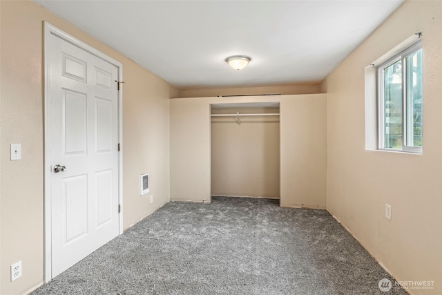 160 Maple St, Cathlamet, WA 98612 - unfurnished bedroom featuring a closet, carpet flooring, and visible vents