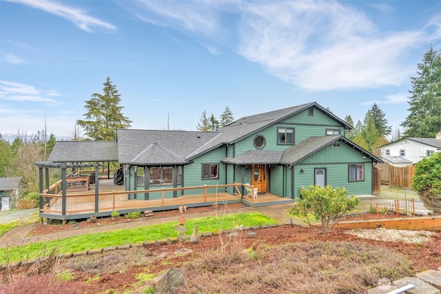 21401 161st Ave E, Graham, WA 98338 - view of front of property featuring a deck, fence, and a shingled roof